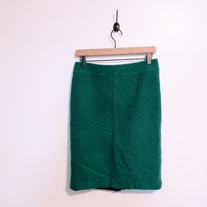 Merona green wool pencil skirt size 2. Lined. Small spot, shown